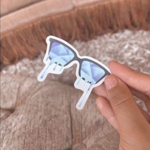 blue and teal Color dripping out of sunglasses